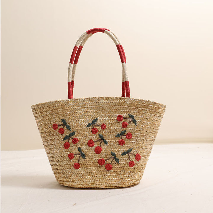 Handcrafted basket bag with vibrant floral embroidery design Bowlift