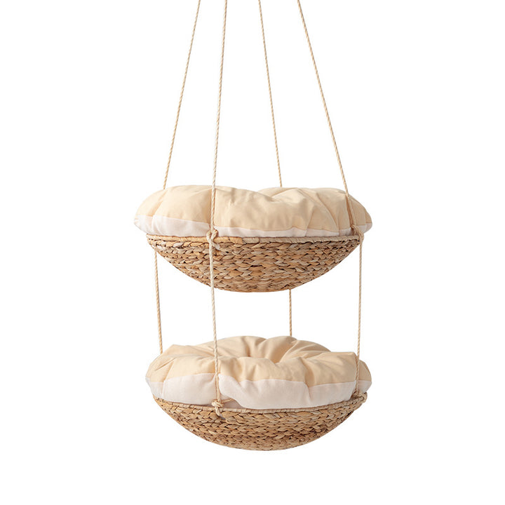 Hanging chair made of braided natural material with comfortable cushions Bowlift