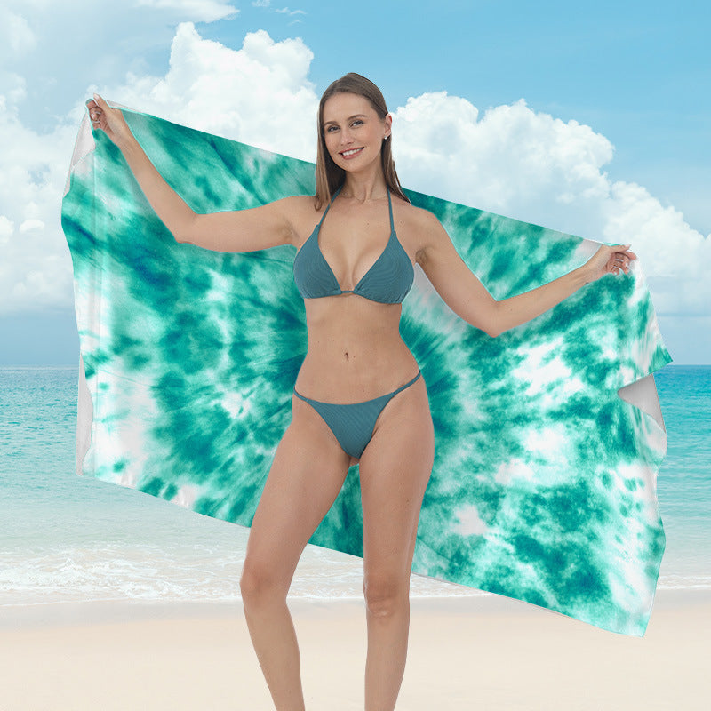 Beach towel with vibrant tropical plant motif Bowlift