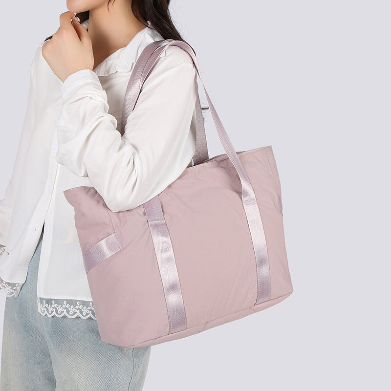 Stylish tote bag with spacious main compartment and reinforced handles Bowlift