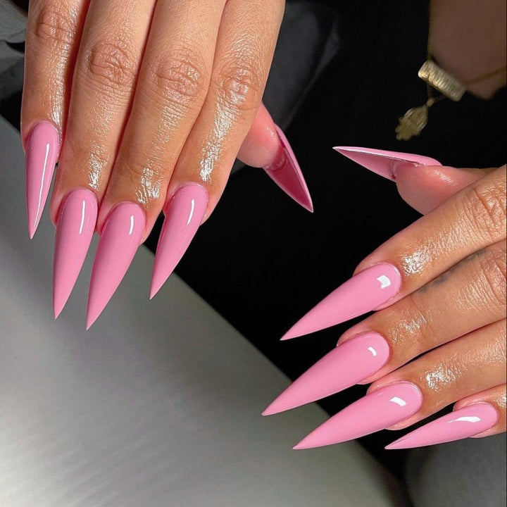 Artificial nail set with pointed design elements Bowlift