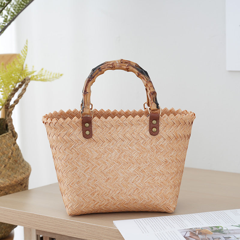 Handbag Made of Woven Bast Bowlift