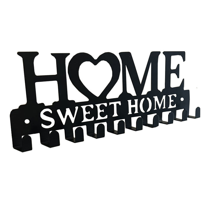 Wall coat rack with heart motif Bowlift