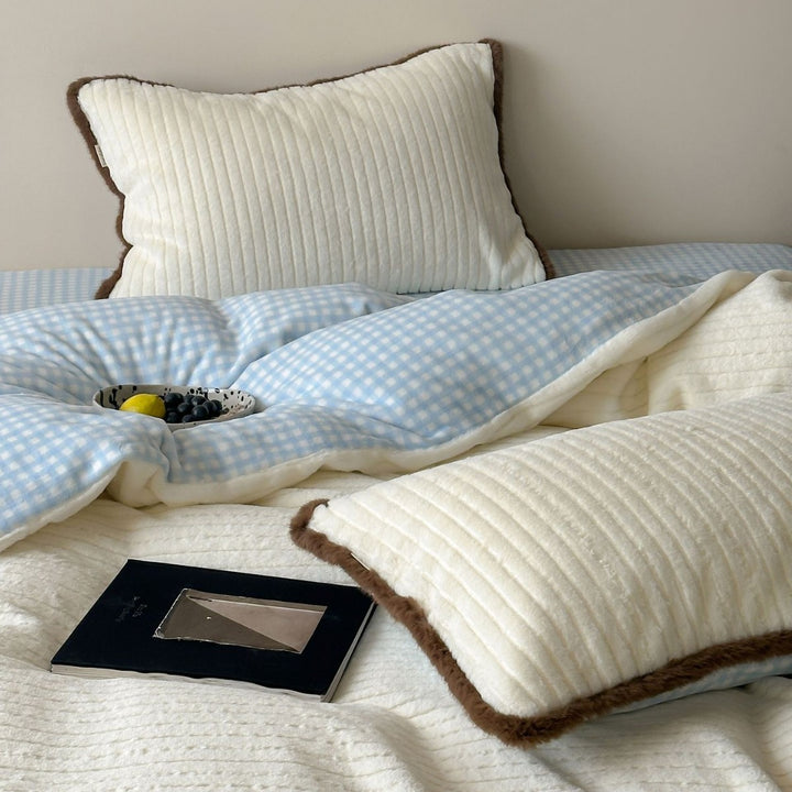 Bedding set with ribbed microfiber surface, reversible function, and checkered pattern fitted sheet