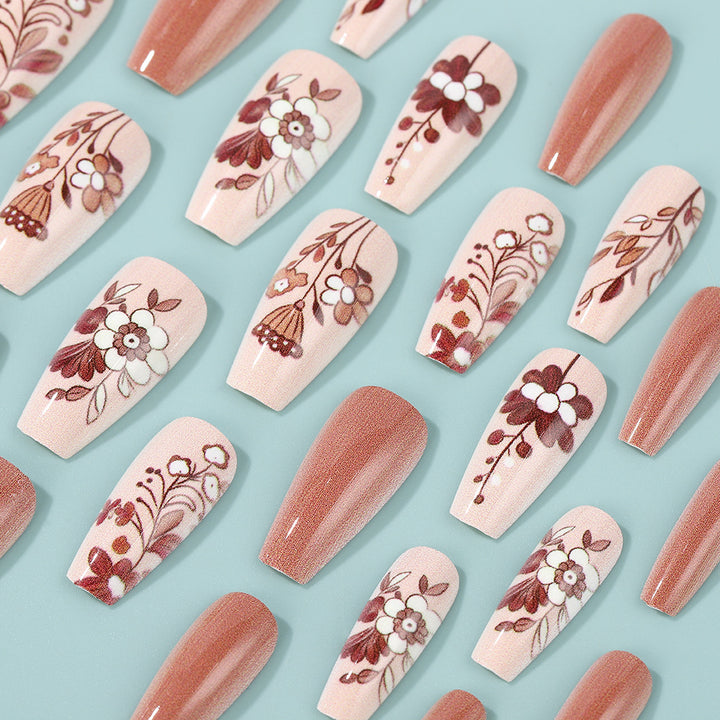 Artificial nails with filigree flower designs Bowlift