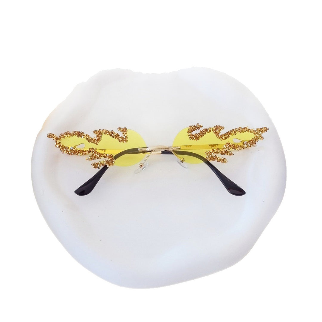Women's extravagant design sunglasses with sparkling embellishments Bowlift