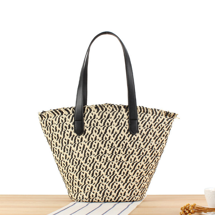 Stylish leisure tote bag made of braided natural material Bowlift