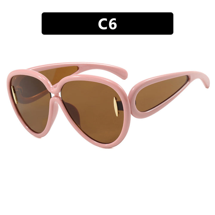 Women extravagant sunglasses in creative design Bowlift