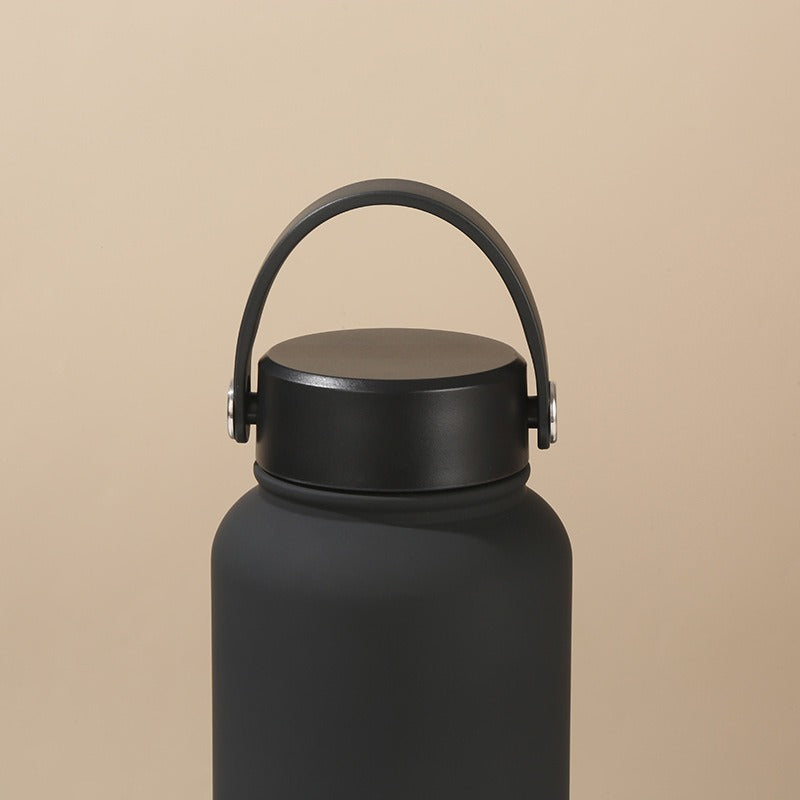 Women's insulated water bottle with ergonomic carrying handle Bowlift
