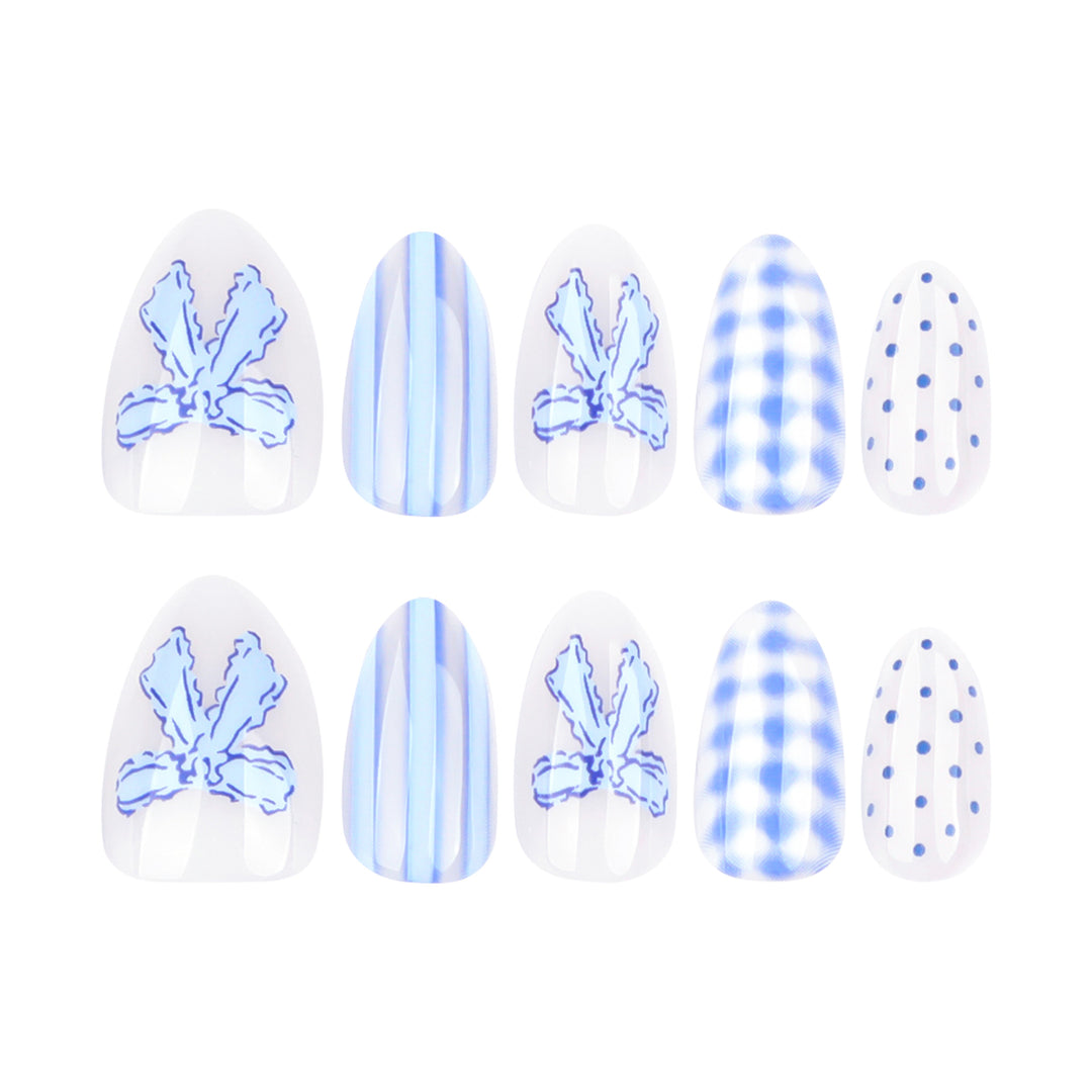 Artistic Nail Art with Floral and Polka Dot Designs Bowlift