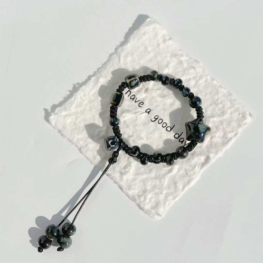 Adjustable Star and Bead Charm Bracelet Bowlift