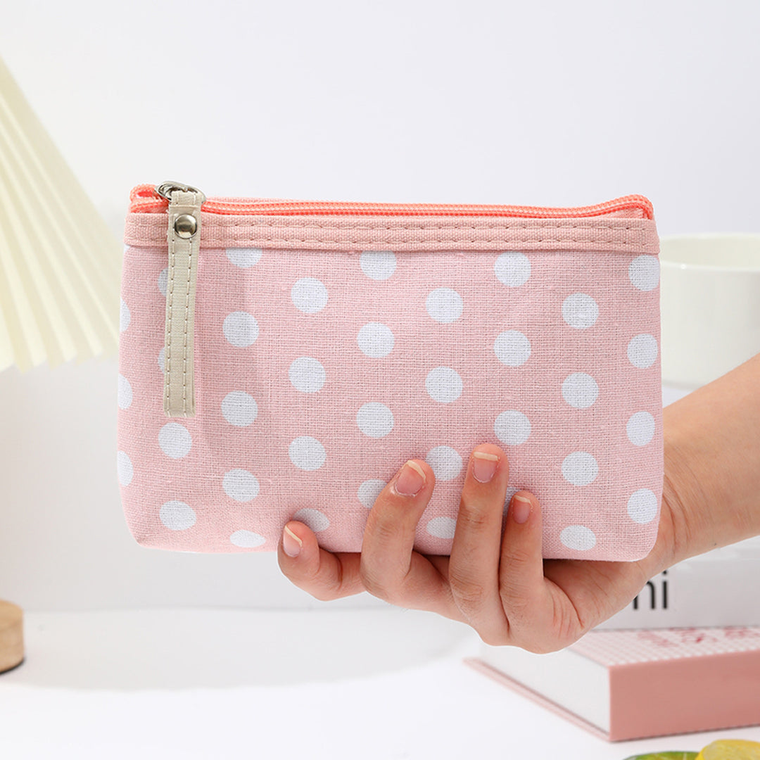 Polka dot canvas cosmetic pouch with top zipper and leather pull Bowlift