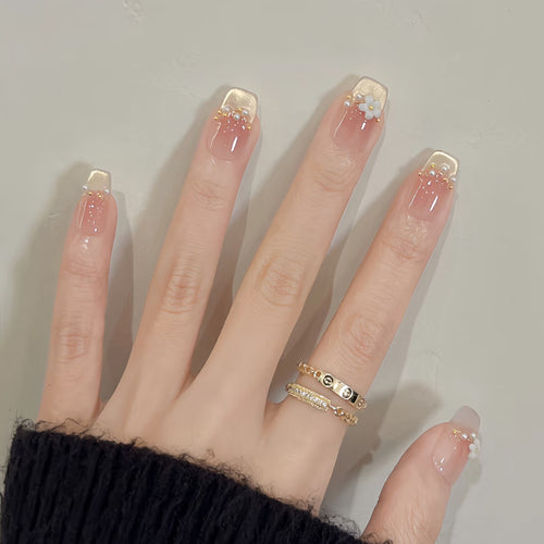 Decorative Press-On Nail Extensions with Floral Accents Bowlift