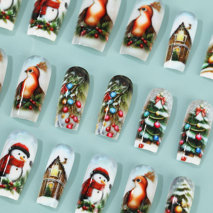 Creative artificial nails in festive Christmas design Bowlift