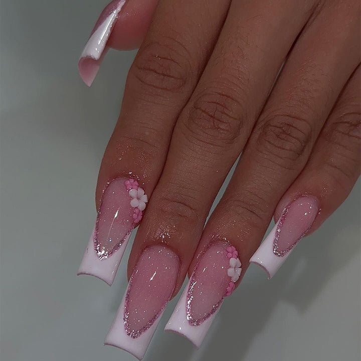 Artful Nail Extensions with Glitter and Flower Accents Bowlift