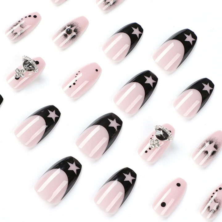 Glamorous nail art with star motifs and glitter accents Bowlift