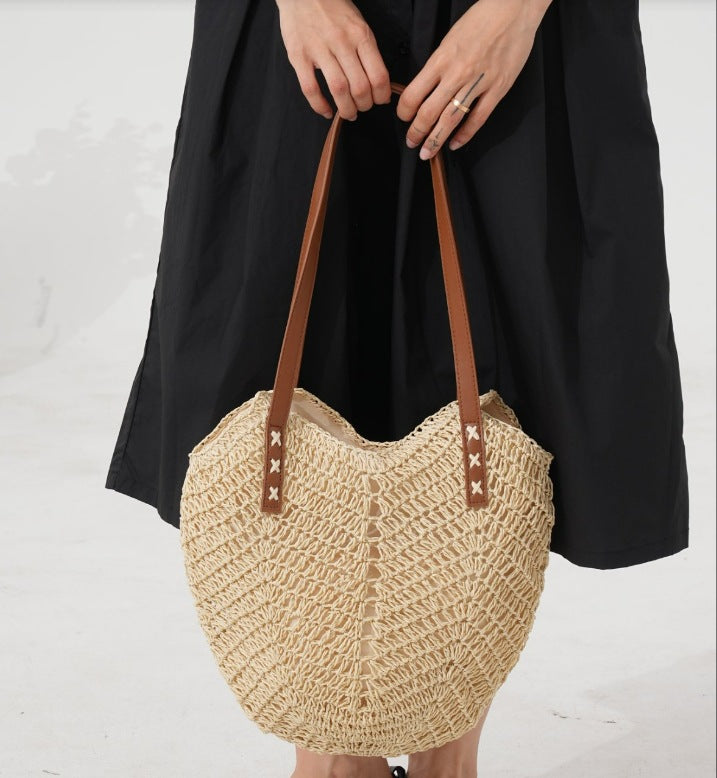 Elegant Bast shoulder bag with leather accents Bowlift