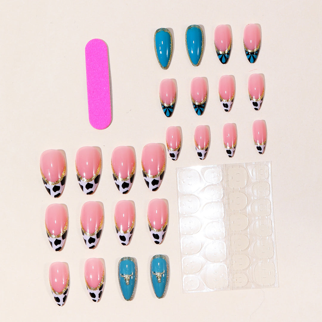 Artistic Stiletto Nail Art Extensions with Cow Print and Gold Accents Bowlift