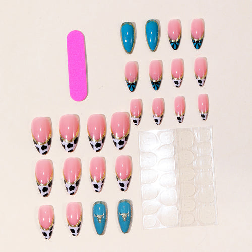 Artistic Stiletto Nail Art Extensions with Cow Print and Gold Accents Bowlift