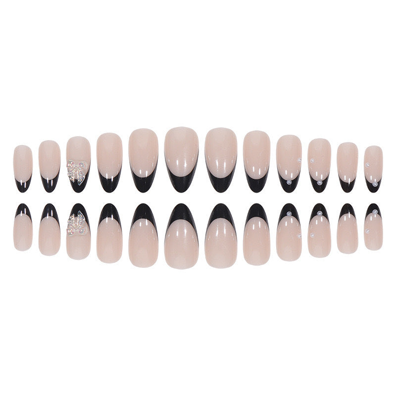 Artificial nail set with glossy French design and delicate 3D accents Bowlift