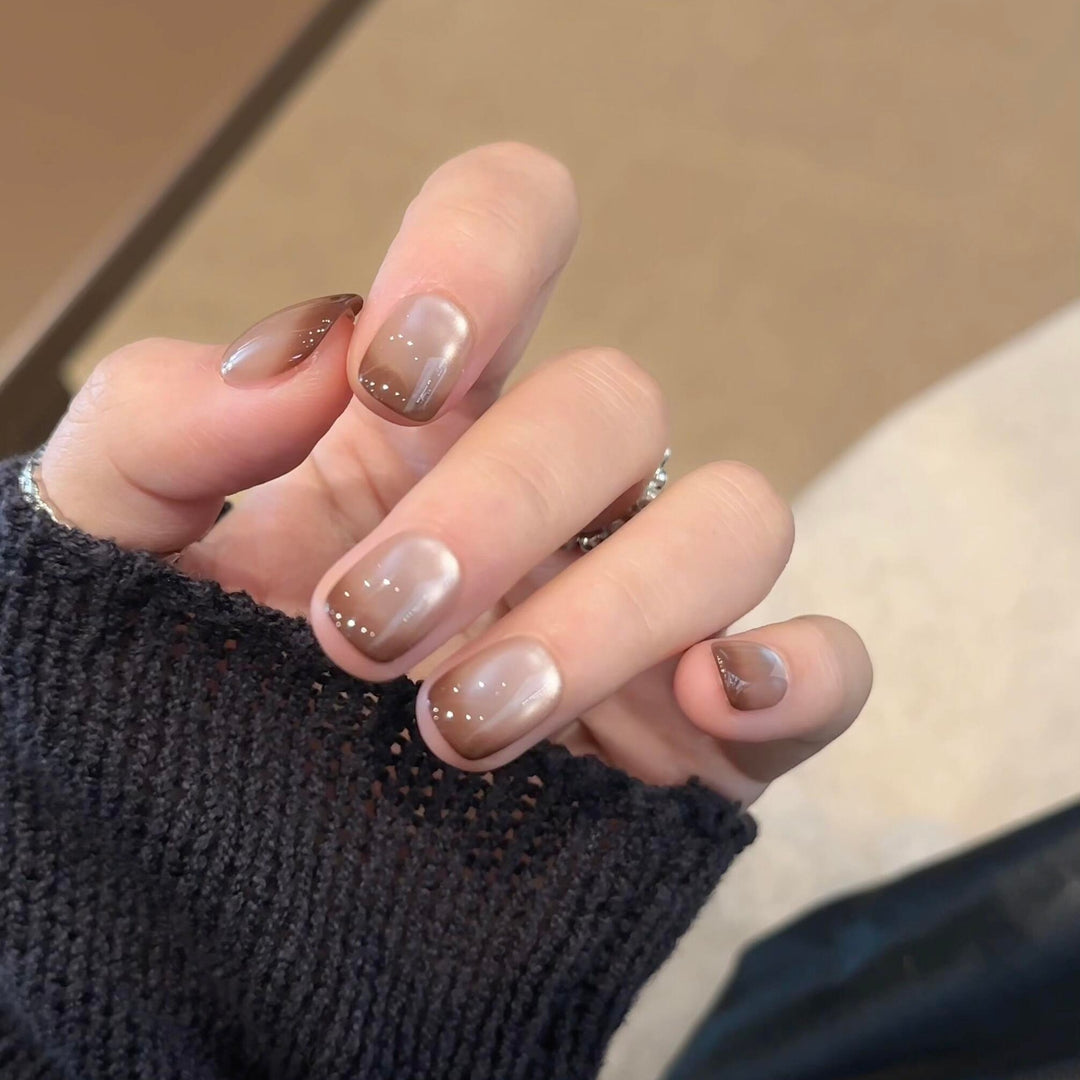 Artificial nails with elegant gradient color and glitter elements Bowlift
