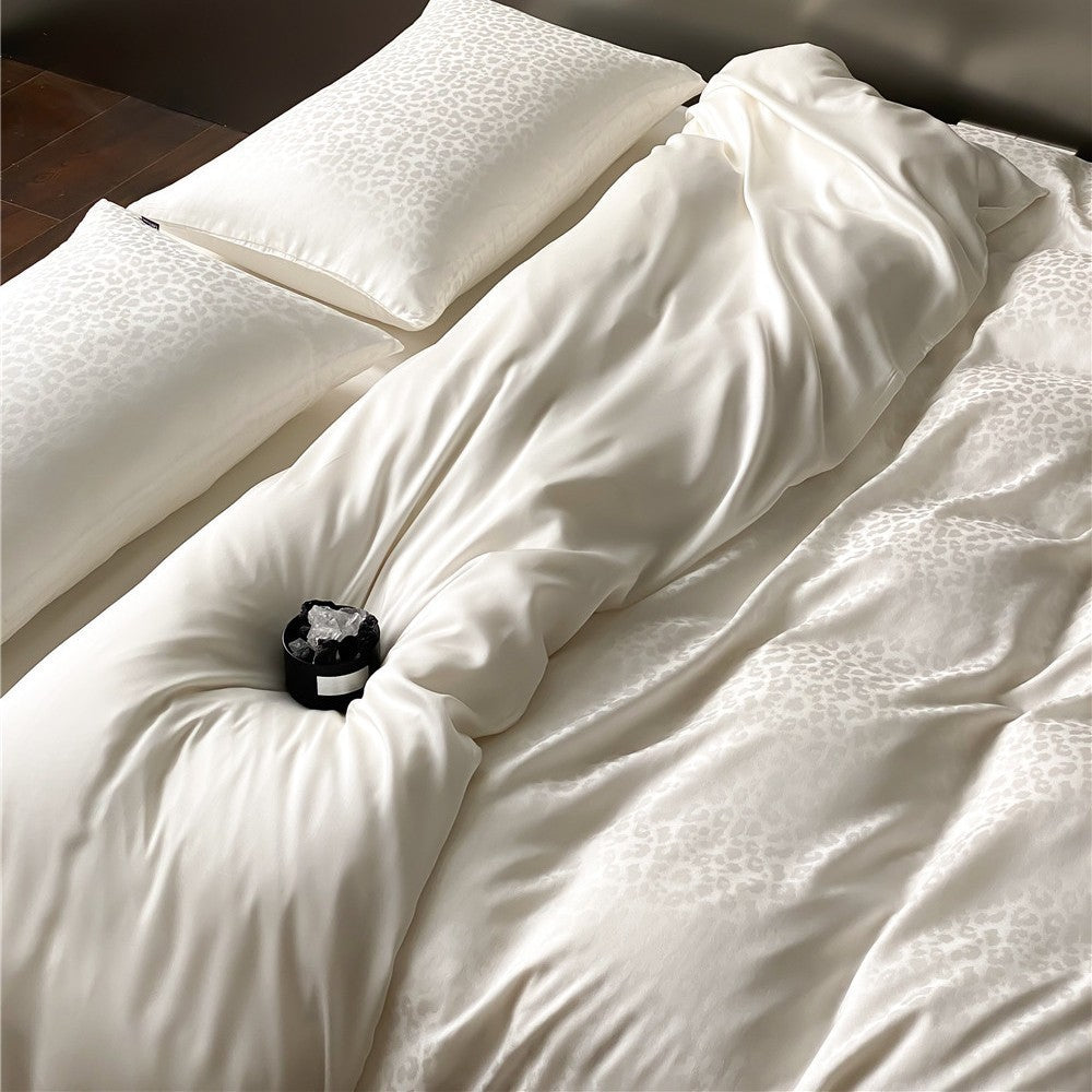 Satin bedding set with subtle leopard jacquard texture and silky feel