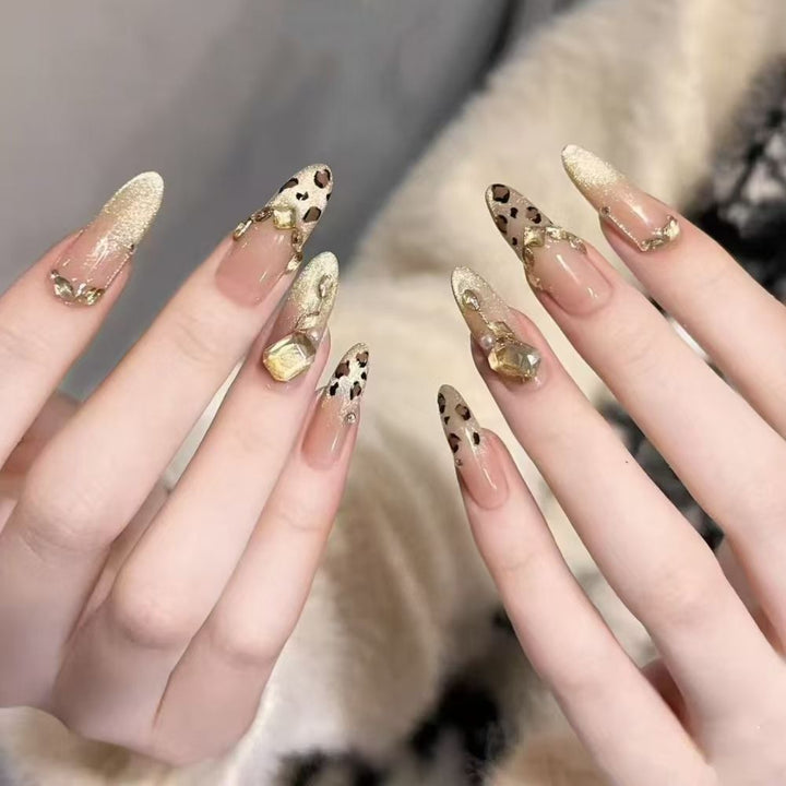 Artificial nails with elegant leopard design and glitter effects Bowlift