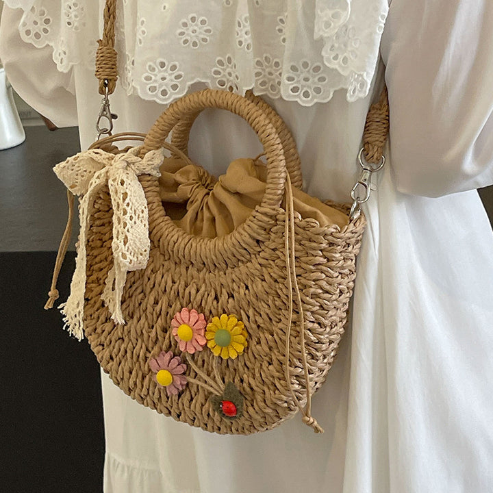 Handcrafted Floral Accent Straw Handbag