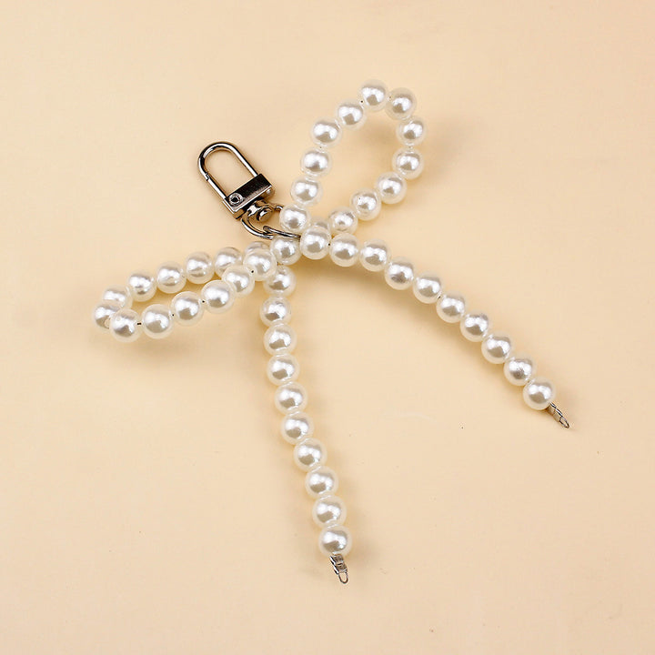 Elegant Pearl Bow Brooch Bowlift