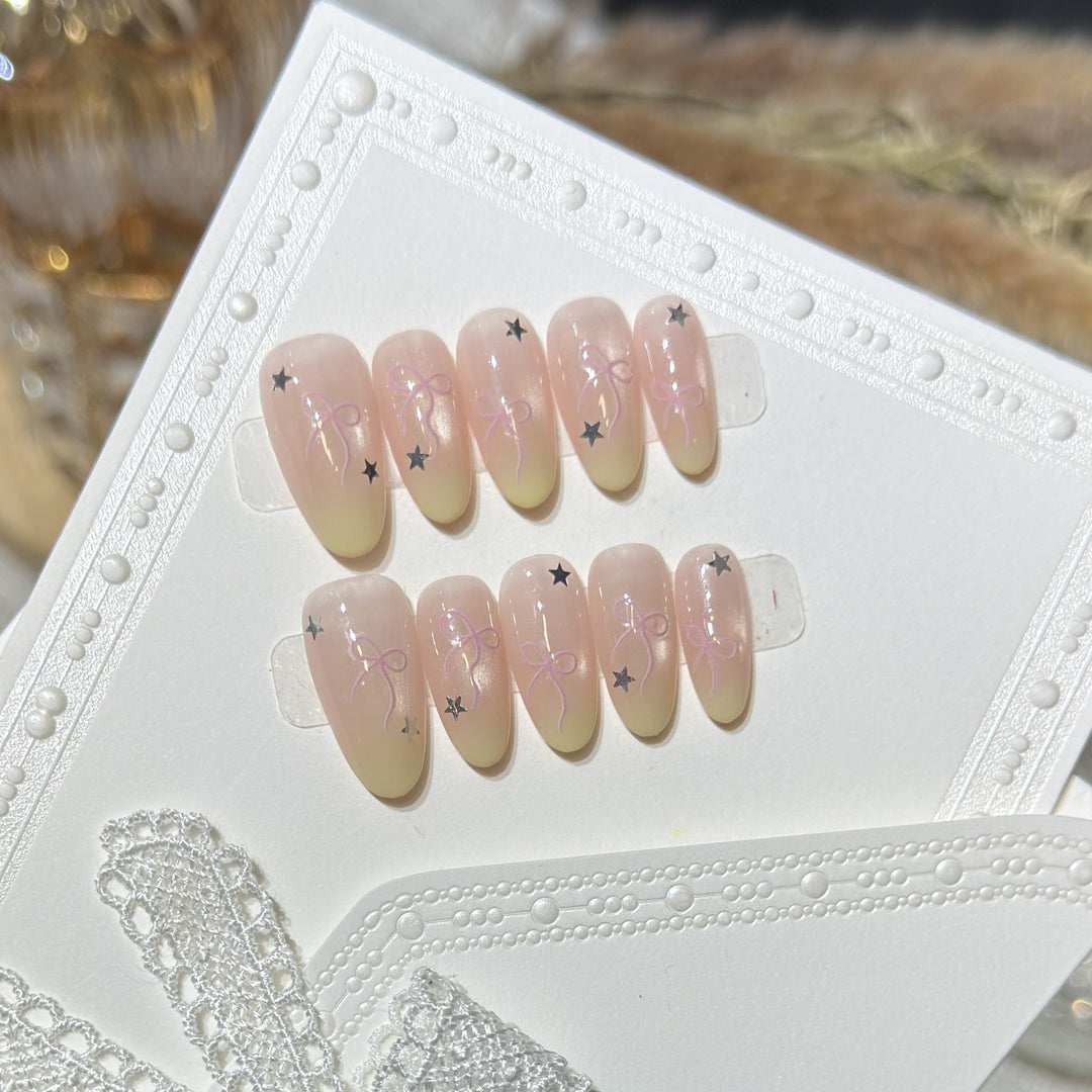 Press-On Nail Set with Bow and Star Accents Bowlift