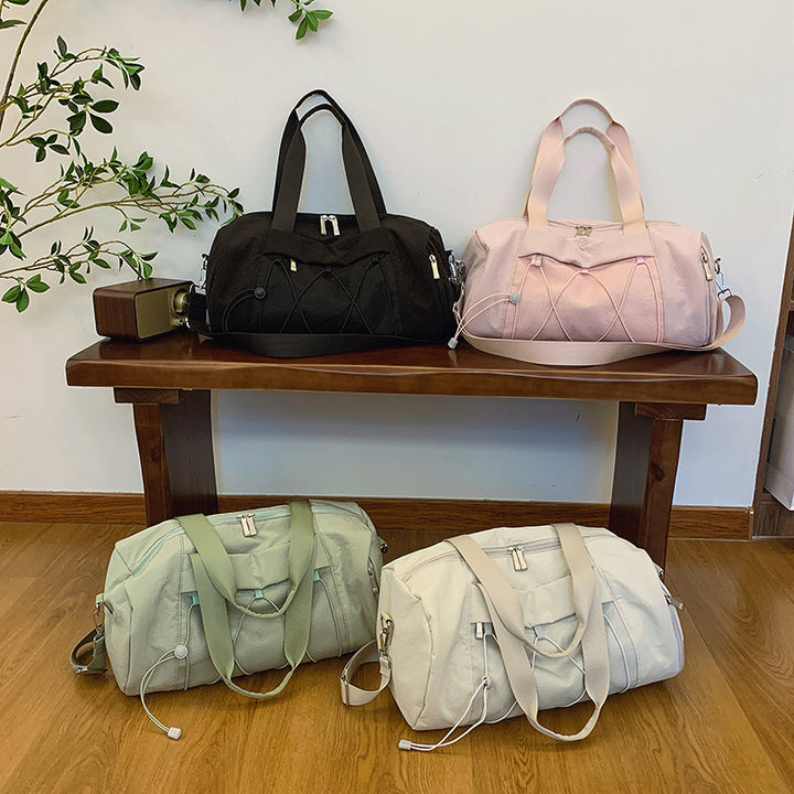 Unisex sport and travel bag with ergonomic carrying handles Bowlift