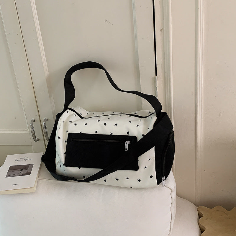 Sporty shoulder bag with practical slip pockets Bowlift