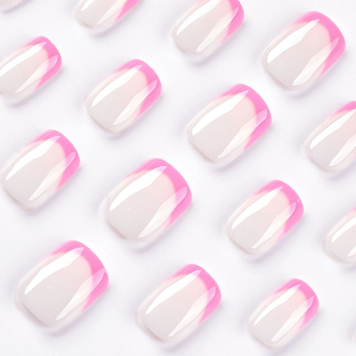 Artful nail design with elegant French tip and modern accents Bowlift