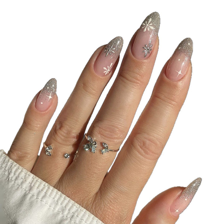 Nail art set with elegant glitter French design and artistic embellishments Bowlift