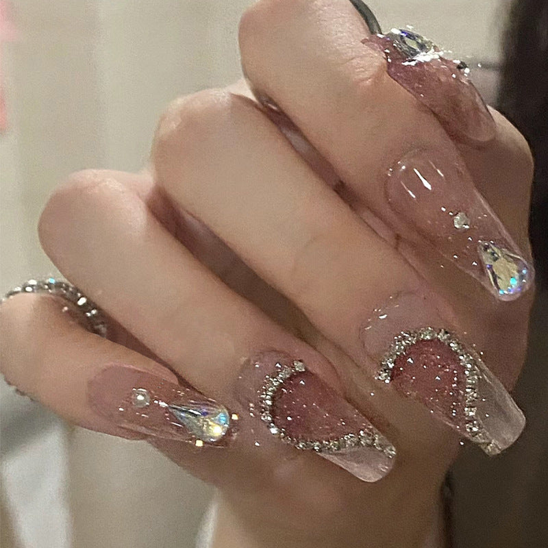 Artistic Press-On Nail Set with Glittery Star Accents Bowlift