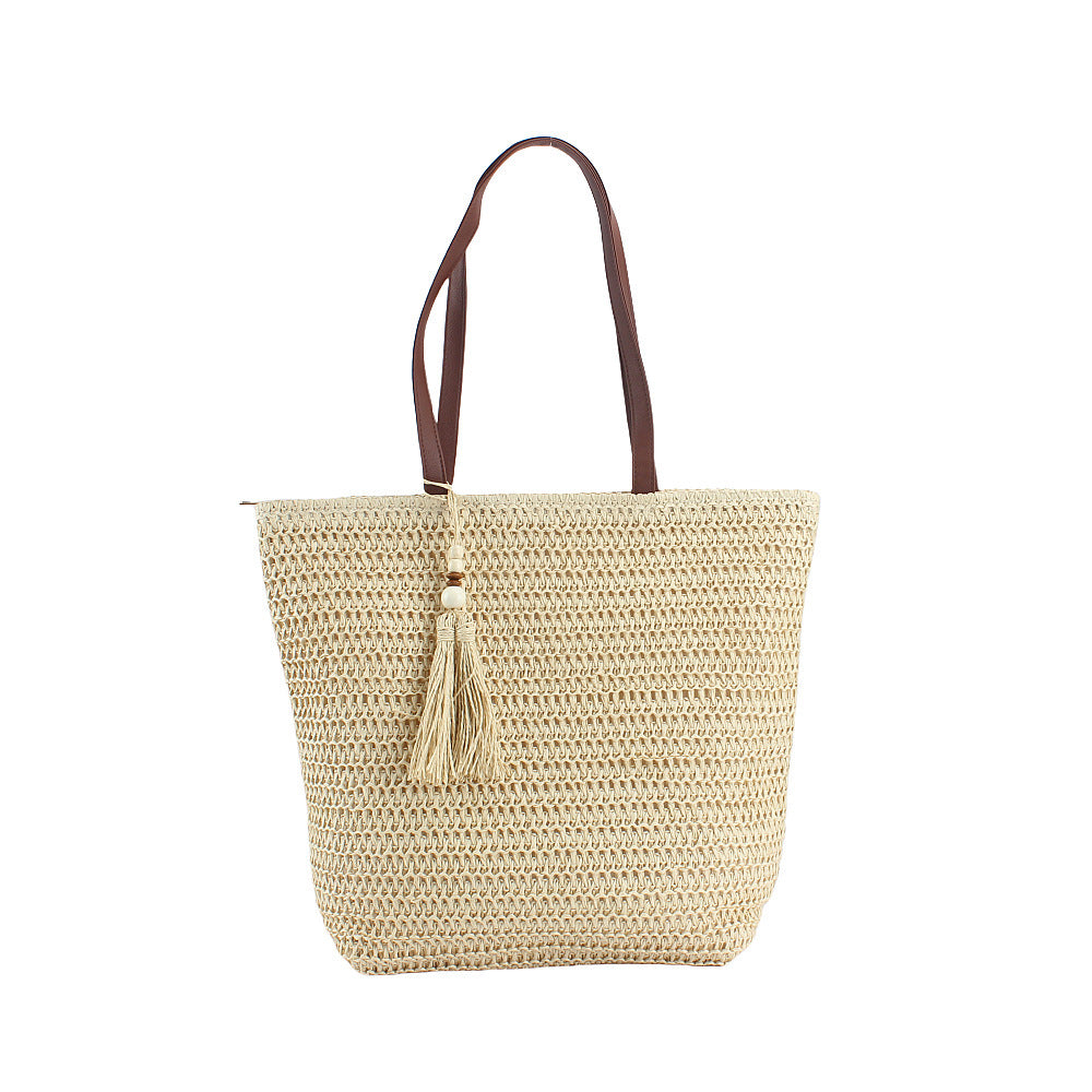 Spacious Shoulder Bag Made of Braided Natural Material with Decorative Tassel Bowlift