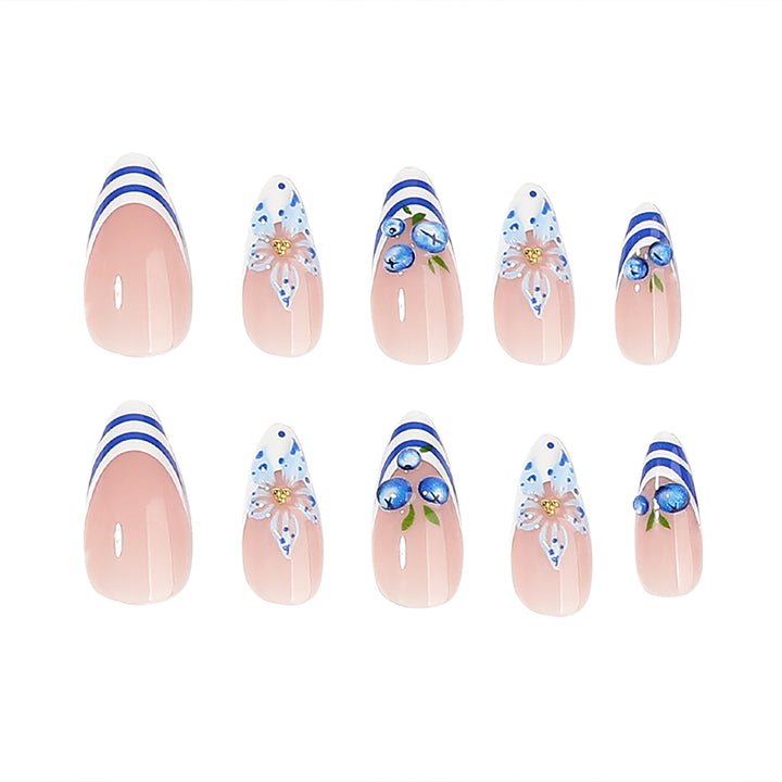 Artful nail design with floral and maritime elements Bowlift