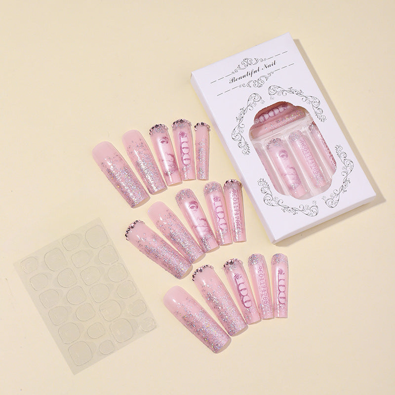 Artificial nail set with shimmering accents Bowlift