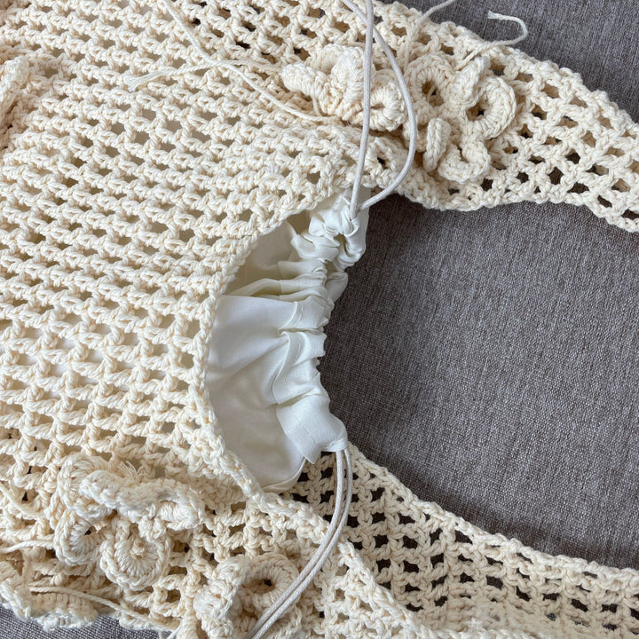 Hand-knotted beach bag with flower details Bowlift