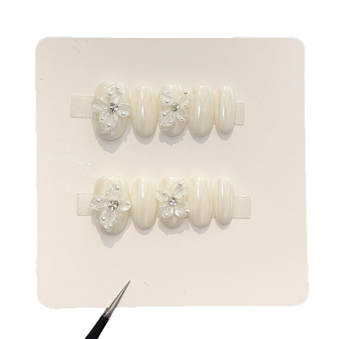 Artificial artificial nails with floral accents Bowlift