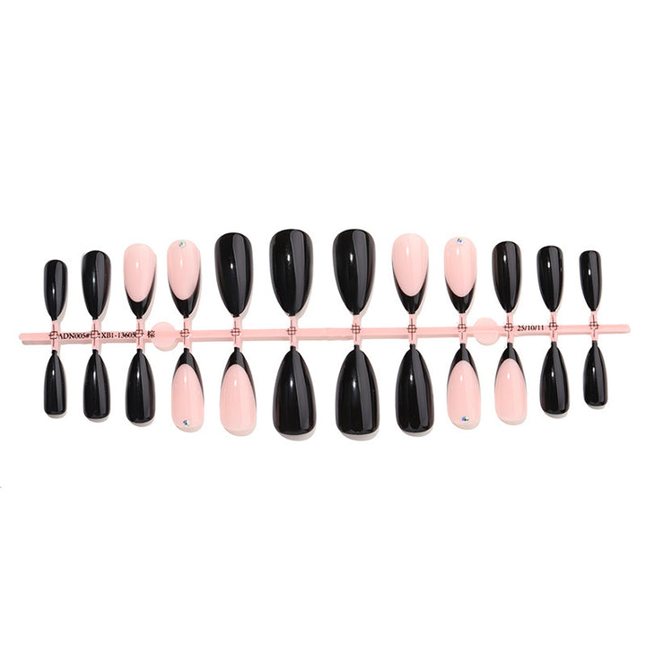 Acrylic nail set with elegant black-pink design and rhinestone-embellished accents Bowlift