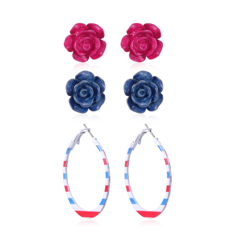 Women's star-shaped enamel earrings with USA flag motif and gold-plated fish Bowlift