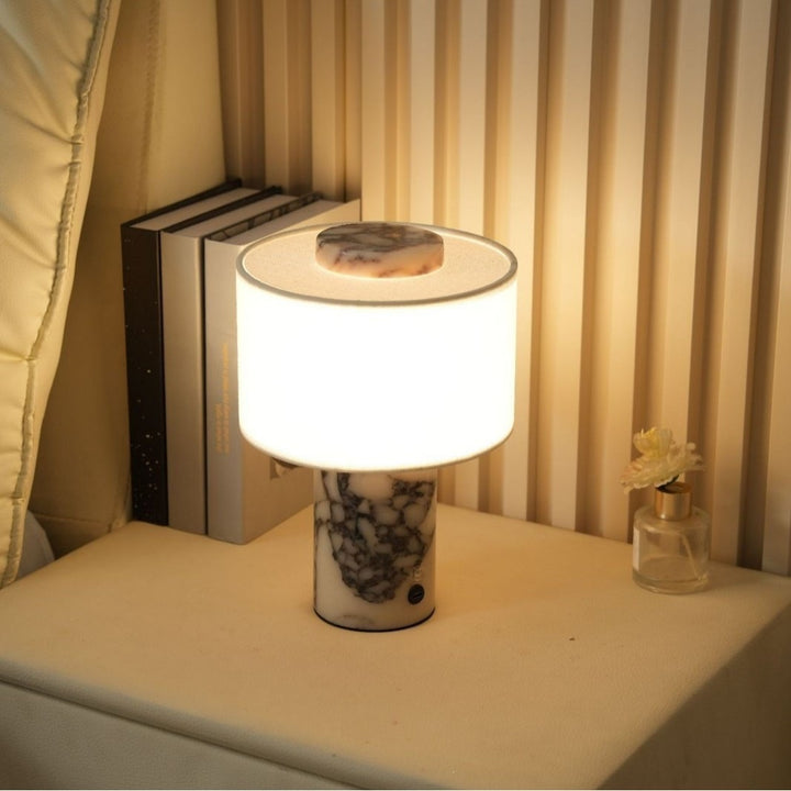 Sculpted natural stone table lamp with fabric drum shade and dimmer Bowlift