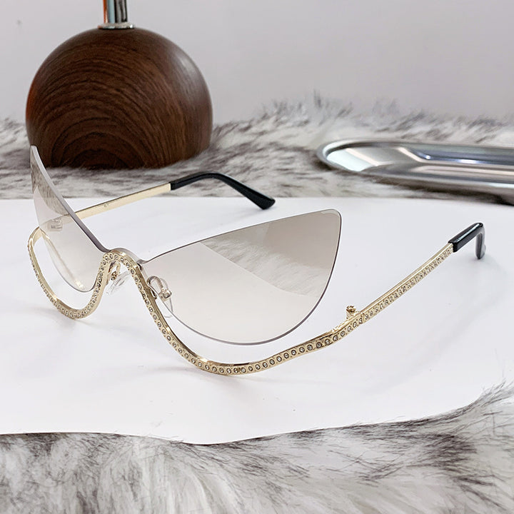 Women's extravagantly shaped Cat-Eye sunglasses with sparkling appliqués Bowlift