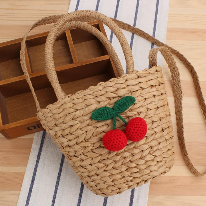 Basket bag with crocheted cherry design Bowlift