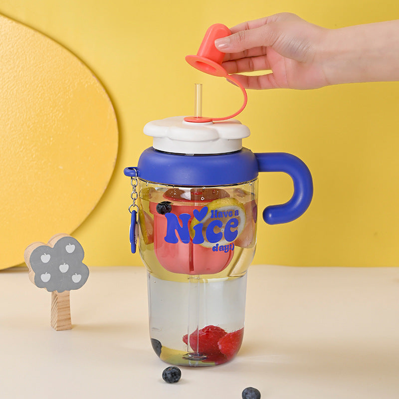 Unisex drinking cup with integrated straw and spill protection Bowlift