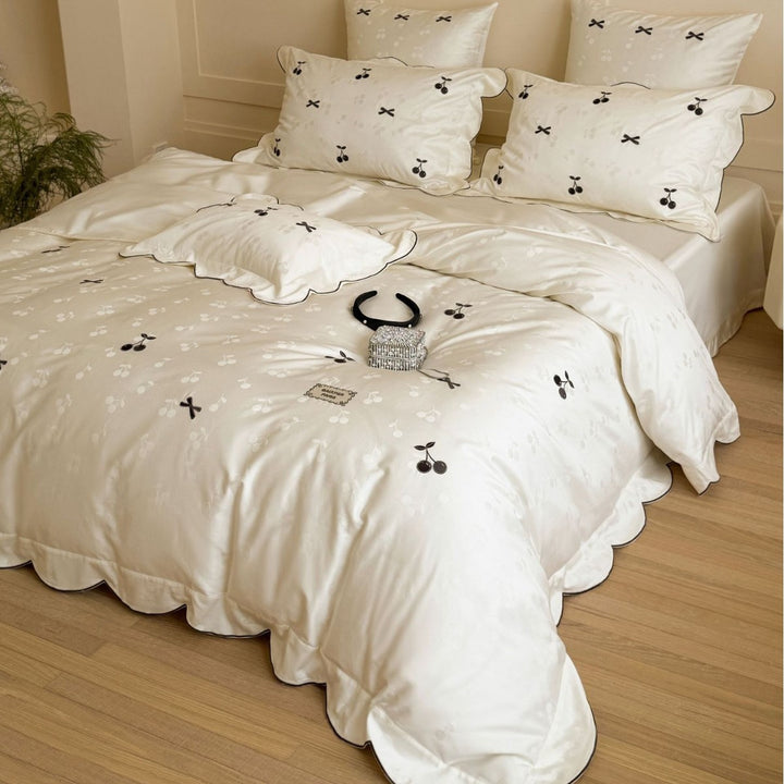 Luxurious satin bedding set with embroidered cherries and curved hem