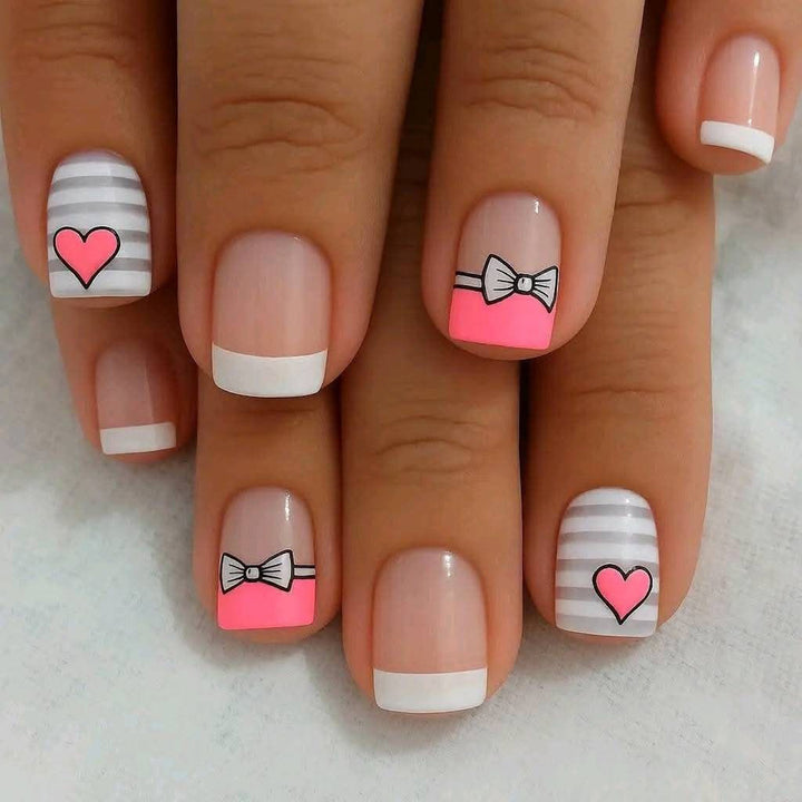 Artificial nails with playful heart and bow pattern Bowlift