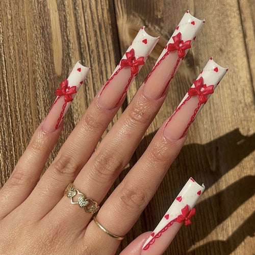 Decorative Press-On Nail Set with Heart and Bow Accents Bowlift