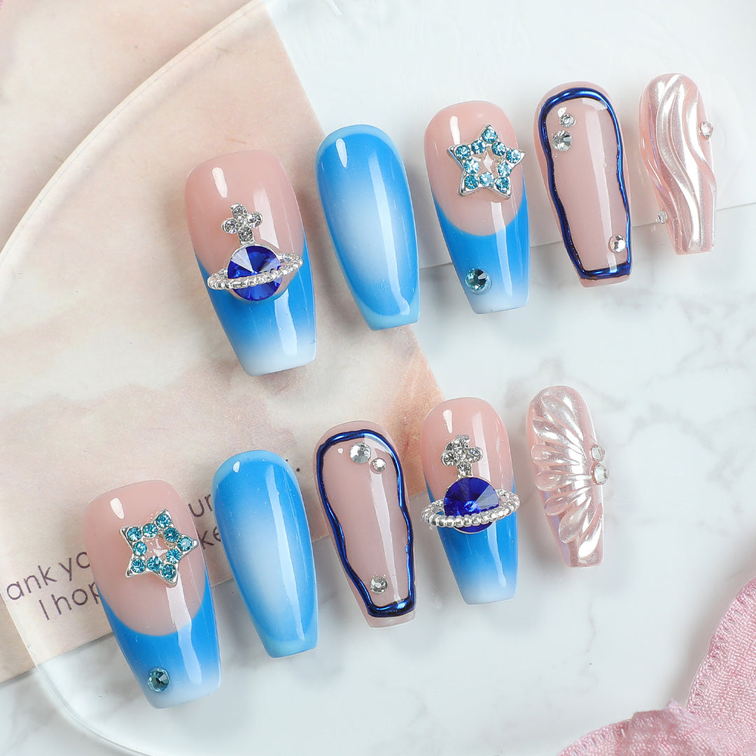 Elegant artificial nail set with delicate ombre effects and sparkling details Bowlift